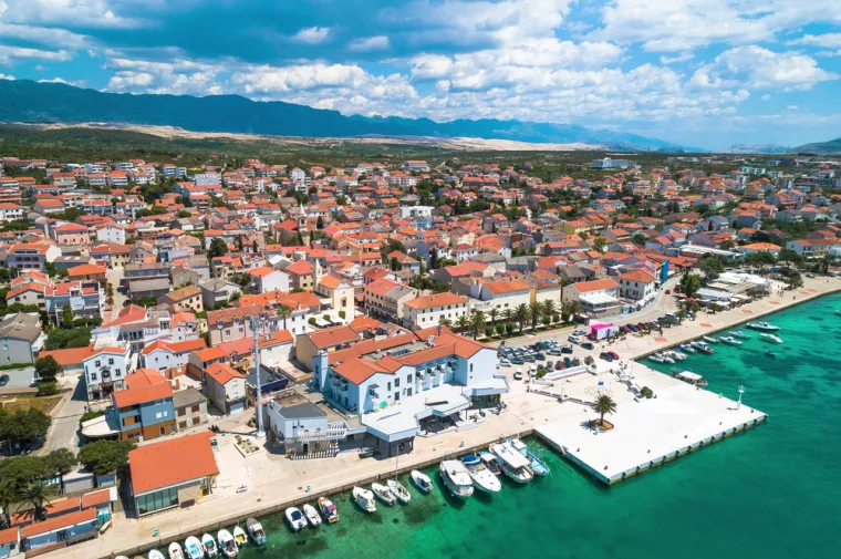 Town of Novalja waterfront on Pag island aerial view, Dalmatia region of Croatia