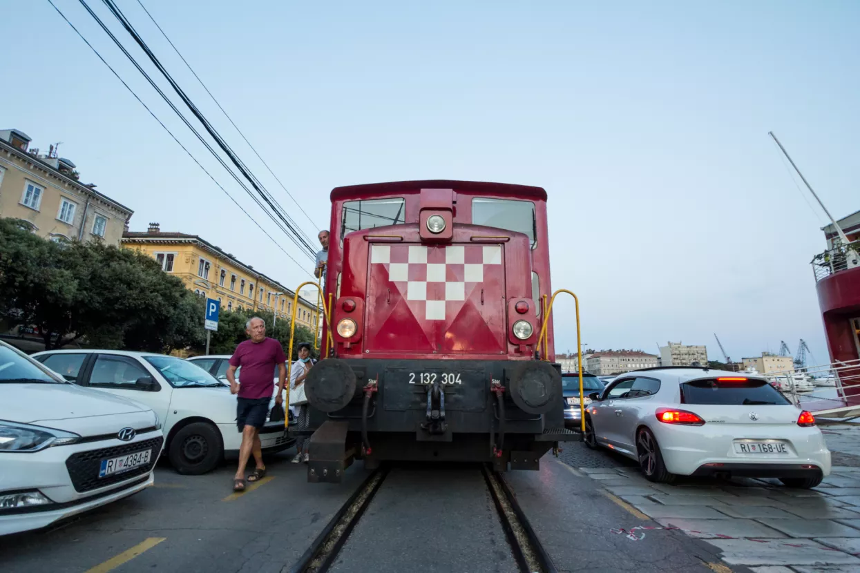RIJEKA, CROATIA - JUNE 18, 2021Switcher, a diesel locomotive, manoeuvering a freight train from HZ Cargo on Luka Rijeka, the Rijeka port, one of the main croatian shipping hubs.